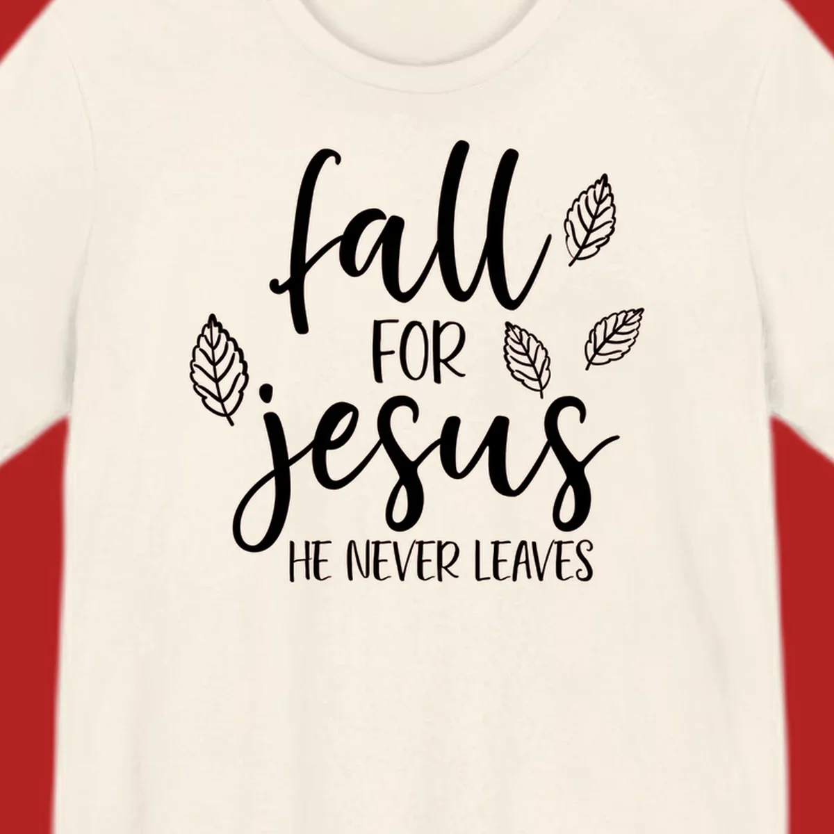 Fall for Jesus He Never Leaves text with autumn leaves design
