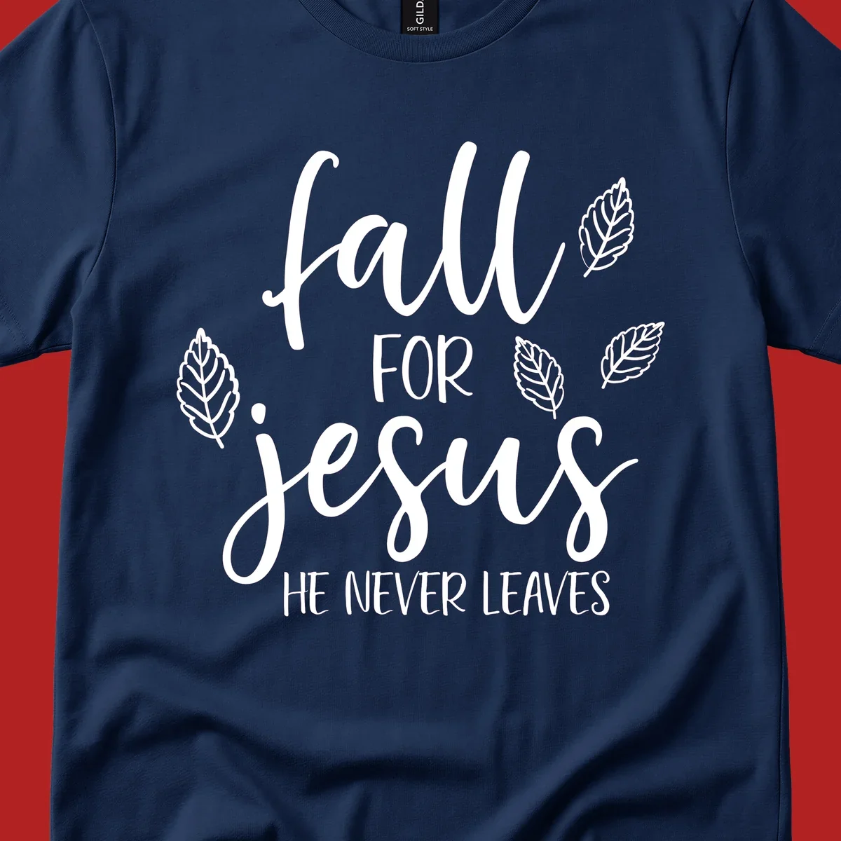 Fall for Jesus He Never Leaves text with autumn leaves design