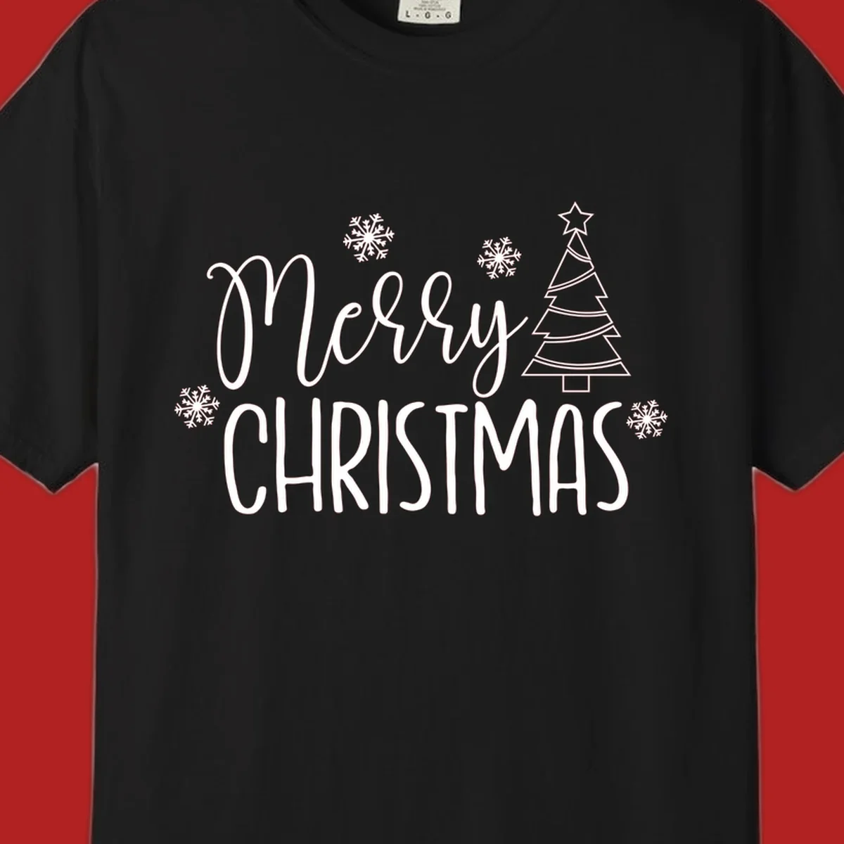 Merry Christmas script and block text with snowflakes and a Christmas tree.