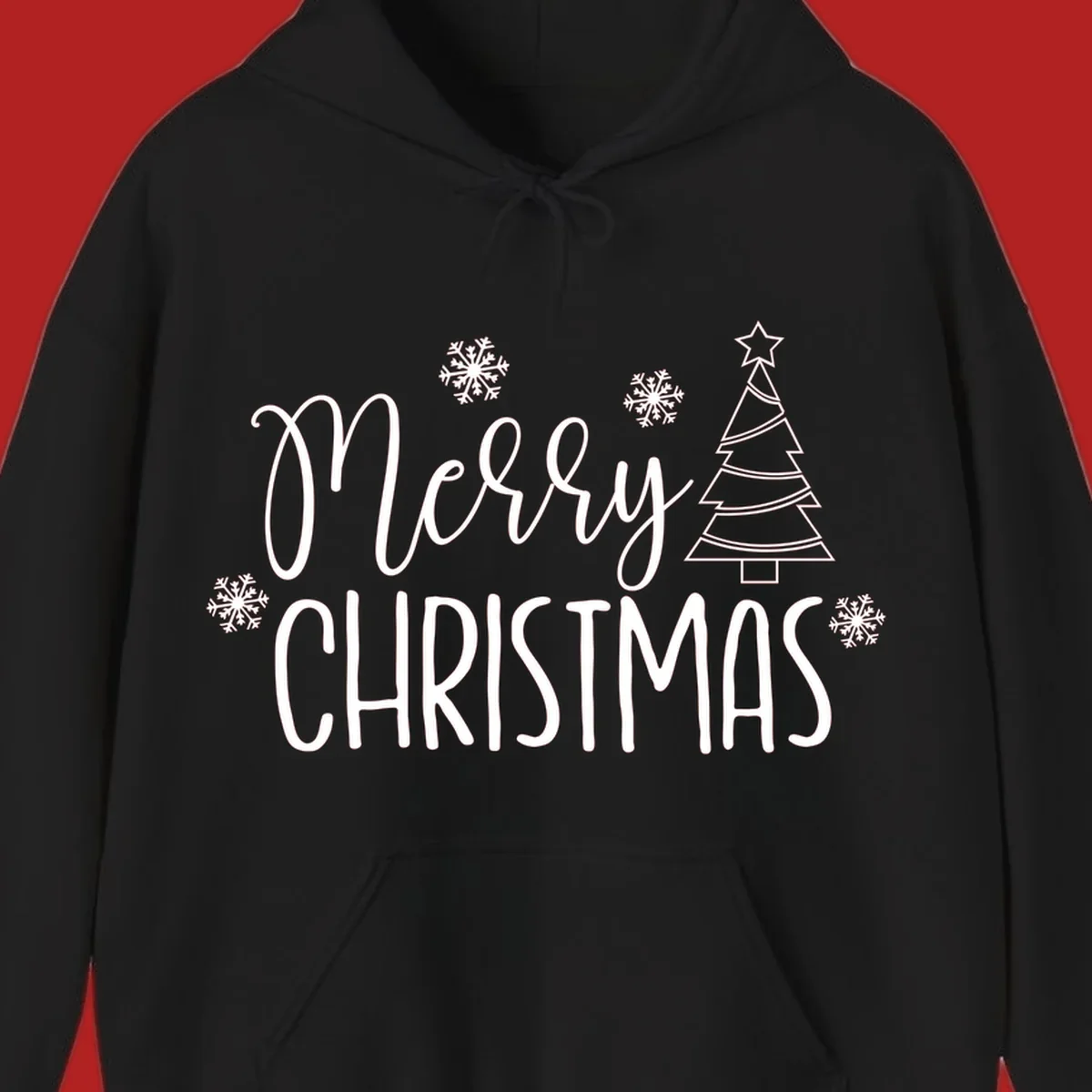 Merry Christmas script and block text with snowflakes and a Christmas tree.