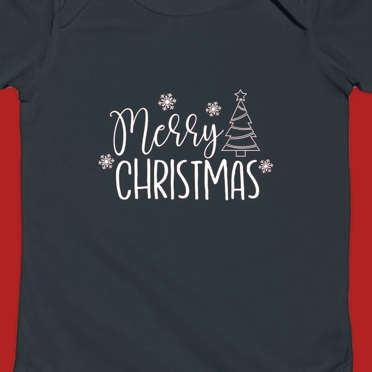 Merry Christmas script and block text with snowflakes and a Christmas tree.