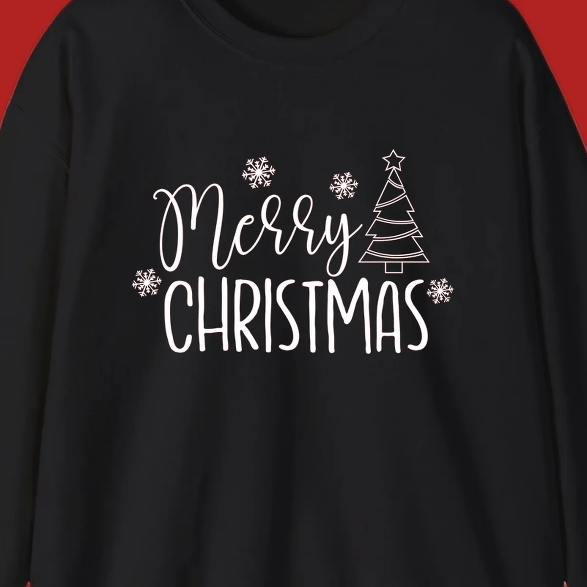 Merry Christmas script and block text with snowflakes and a Christmas tree.
