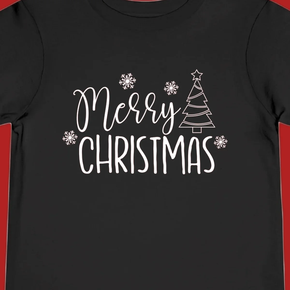 Merry Christmas script and block text with snowflakes and a Christmas tree.
