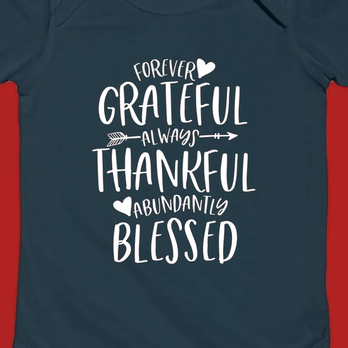 Grateful thankful blessed lettering with heart and arrow graphic