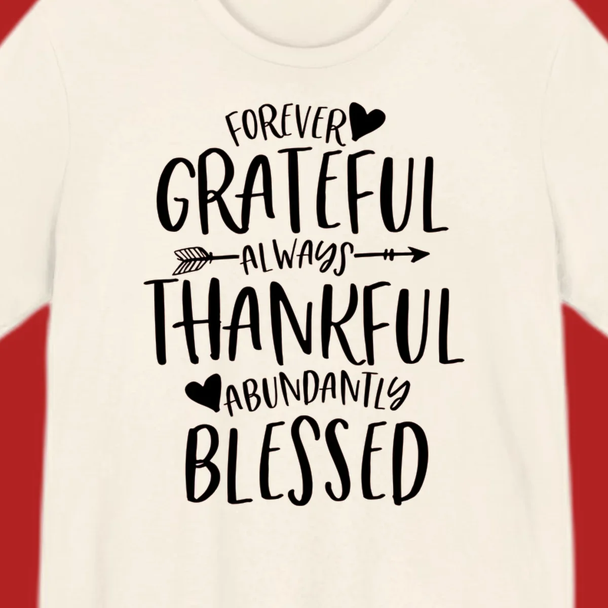 Grateful thankful blessed lettering with heart and arrow graphic