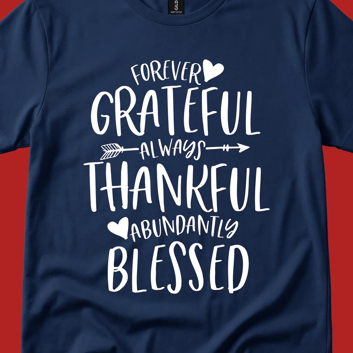 Grateful thankful blessed lettering with heart and arrow graphic