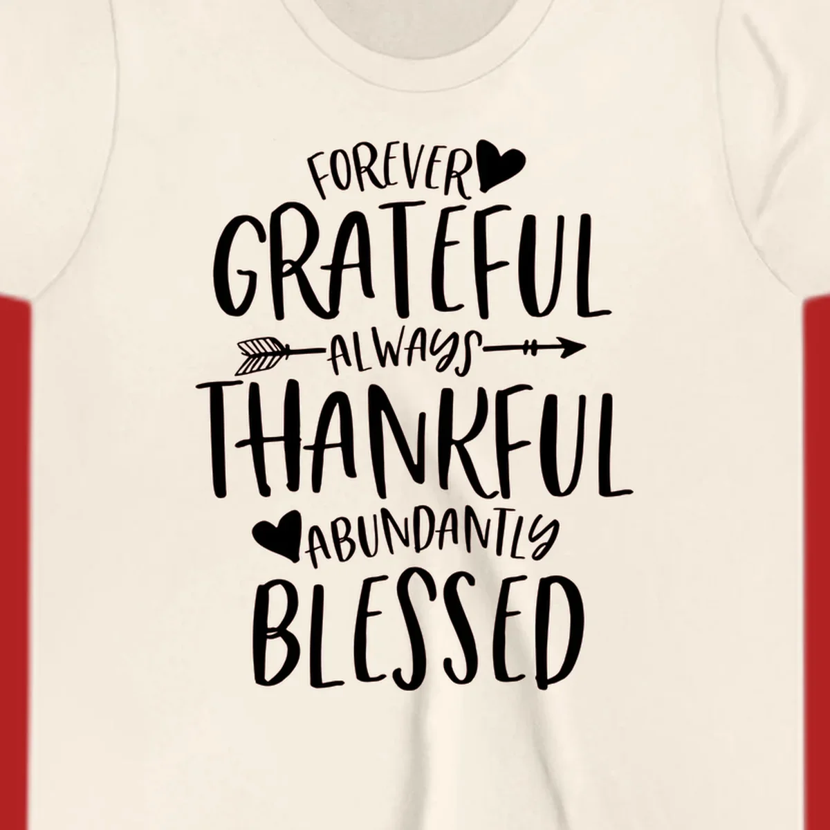 Grateful thankful blessed lettering with heart and arrow graphic