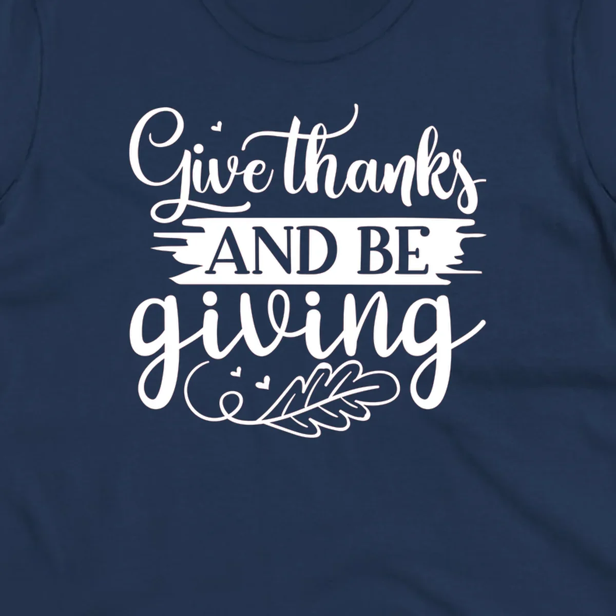 Give thanks and be giving Thanksgiving text with leaf illustration.