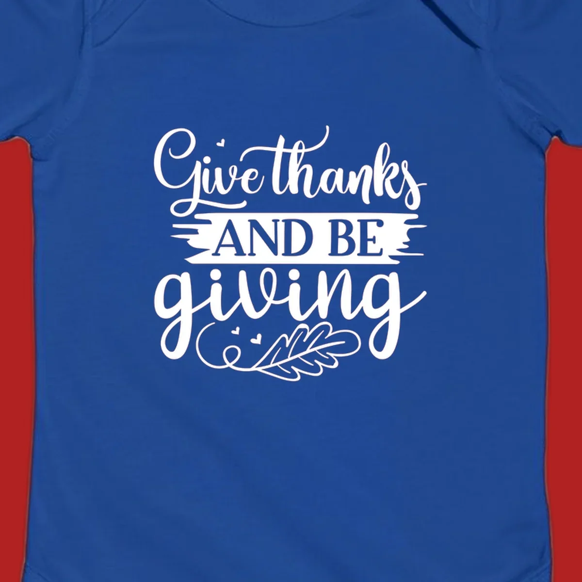 Give thanks and be giving Thanksgiving text with leaf illustration.