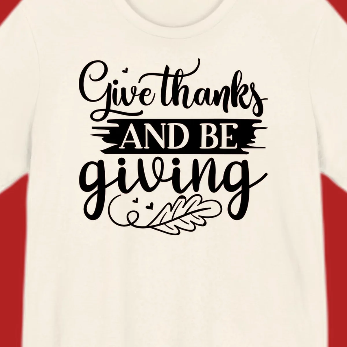Give thanks and be giving Thanksgiving text with leaf illustration.