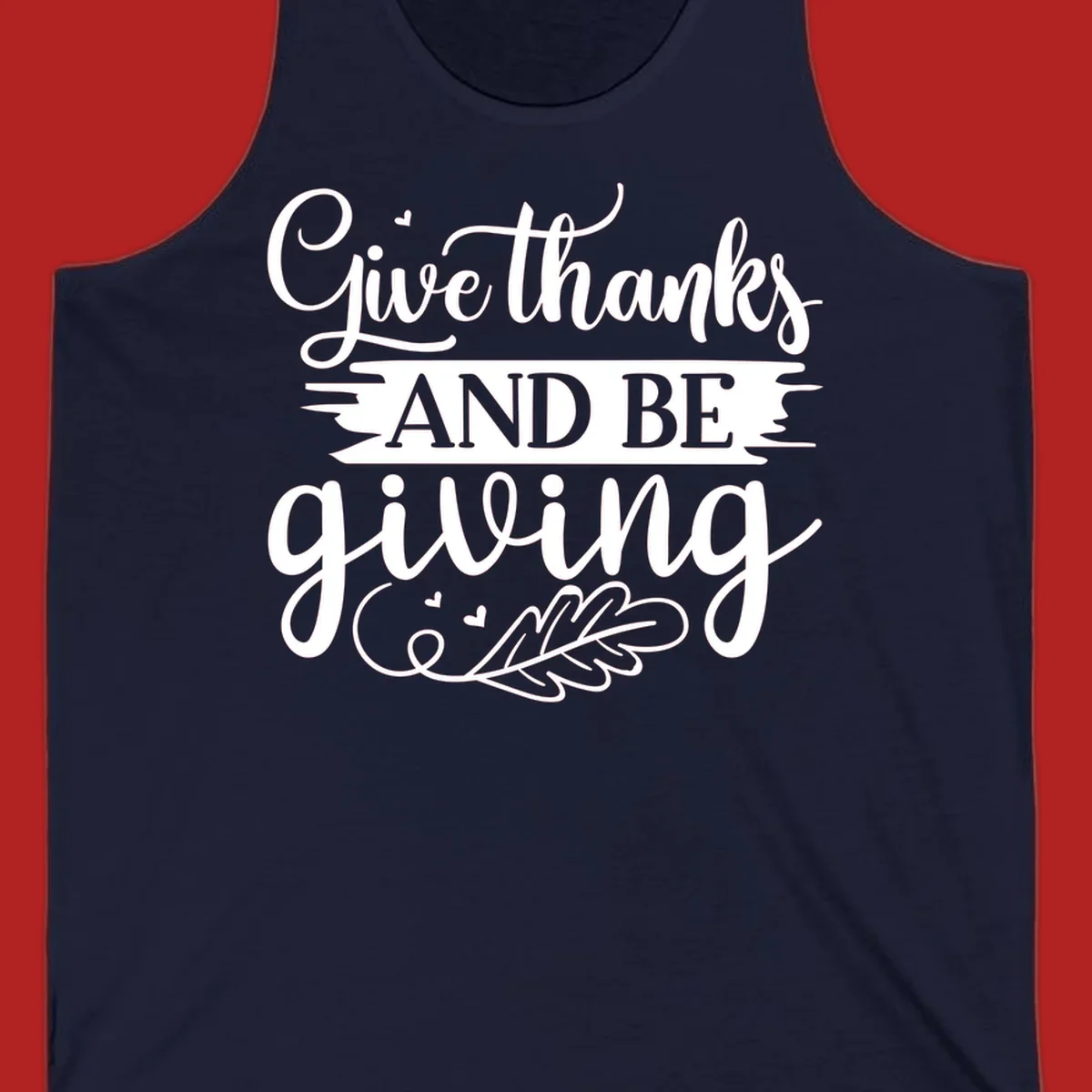Give thanks and be giving Thanksgiving text with leaf illustration.