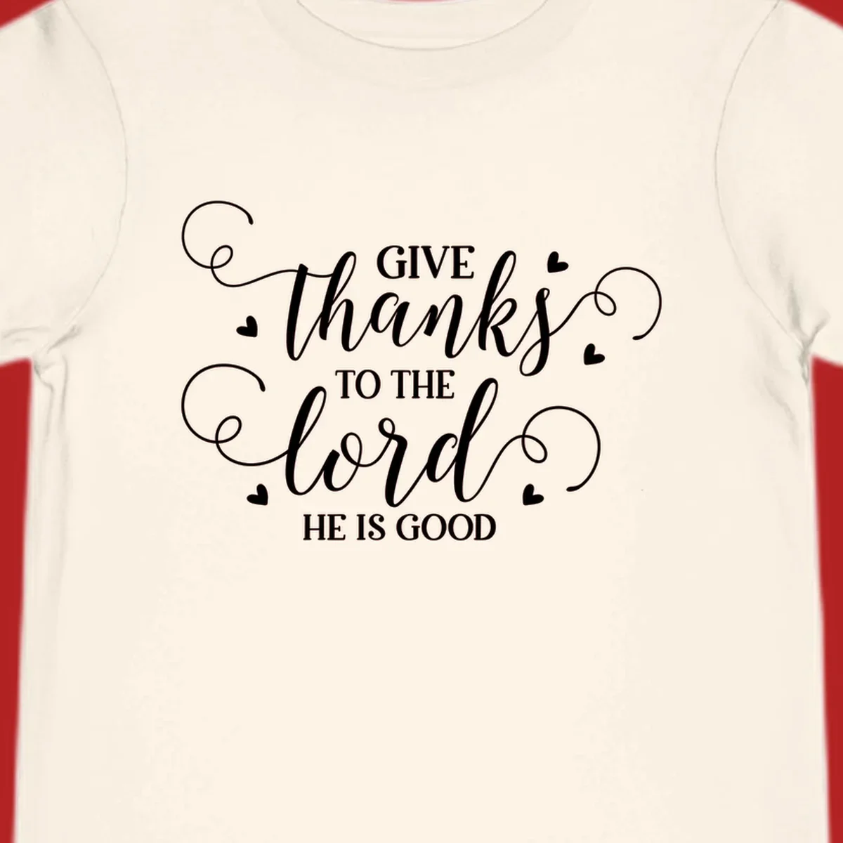 Give Thanks To The Lord Christian Typography design with white lettering and decorative hearts.