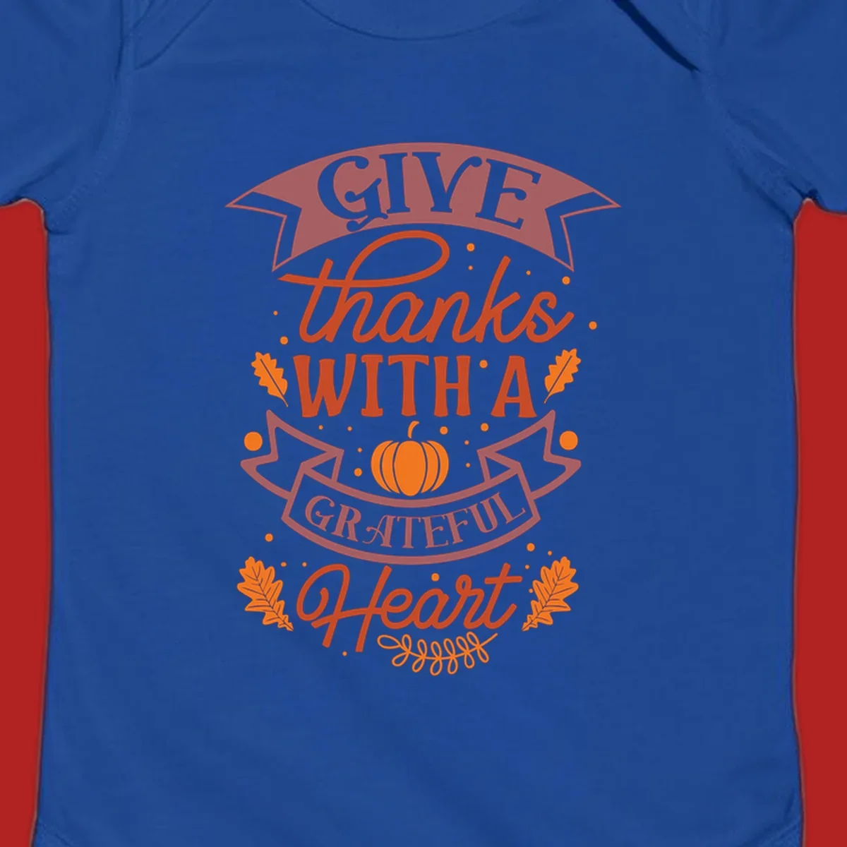Grateful Heart Thanksgiving design with text, pumpkin, and leaves.