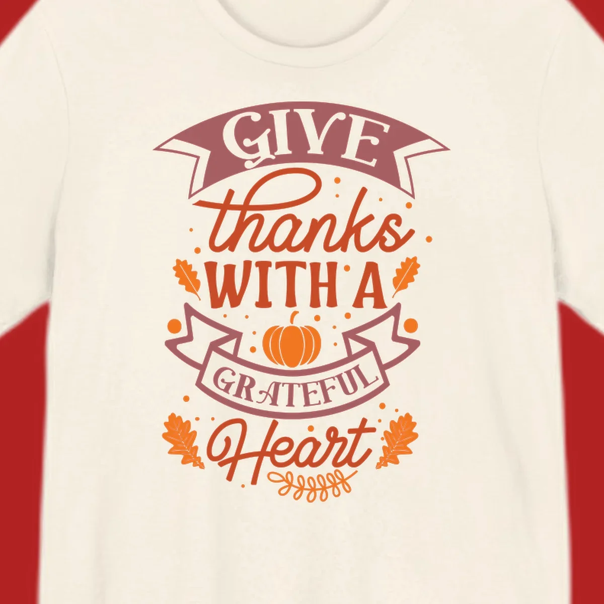Grateful Heart Thanksgiving design with text, pumpkin, and leaves.