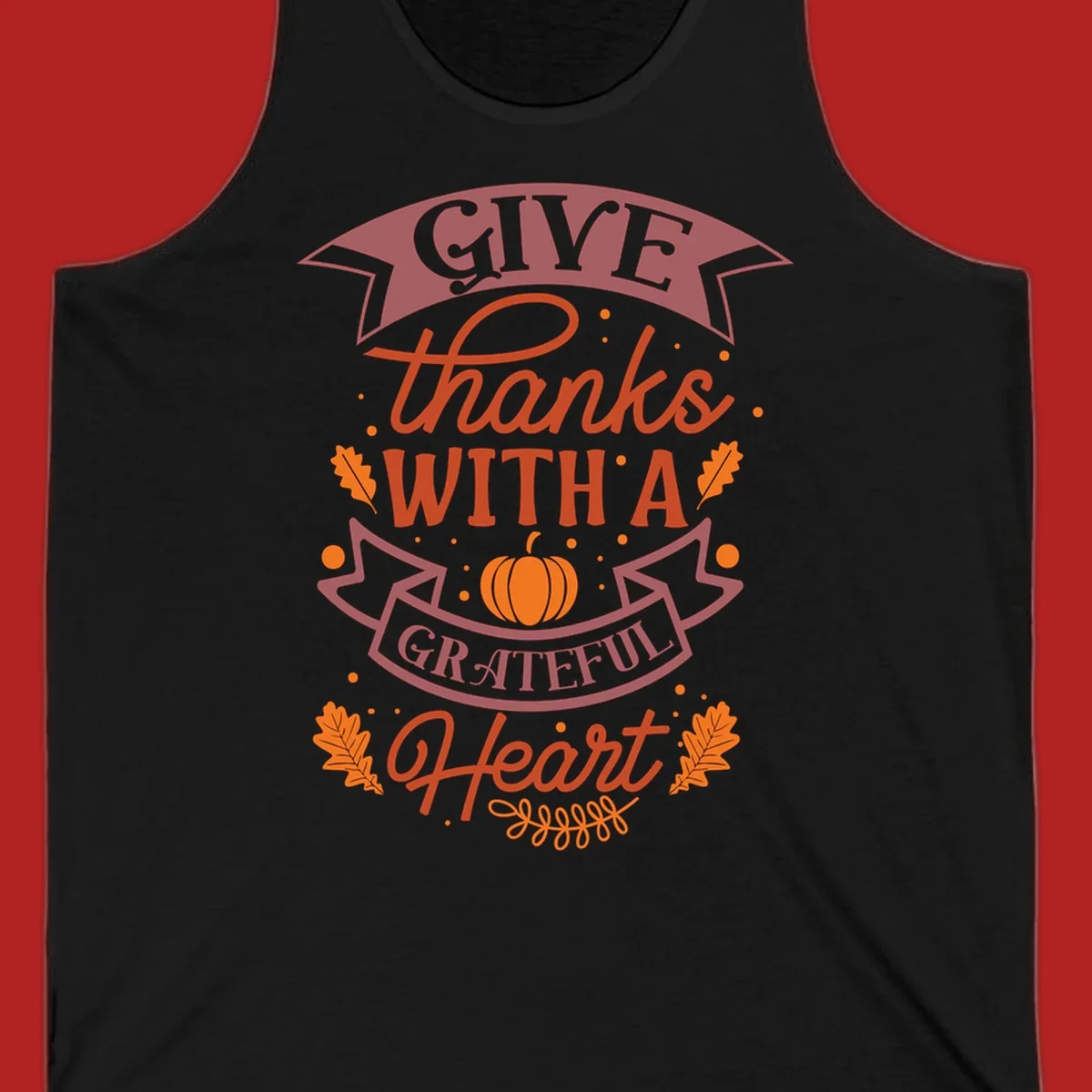Grateful Heart Thanksgiving design with text, pumpkin, and leaves.