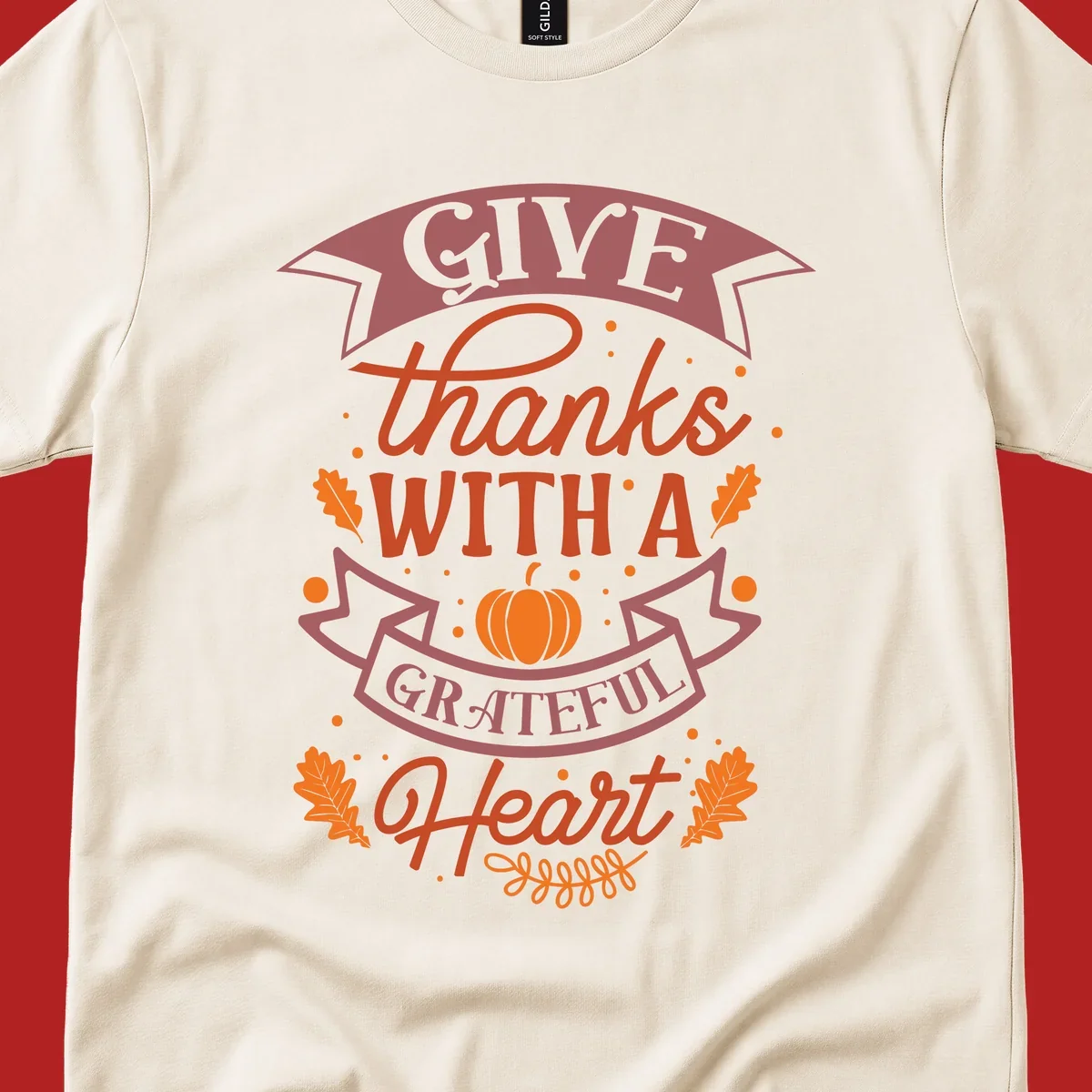 Grateful Heart Thanksgiving design with text, pumpkin, and leaves.