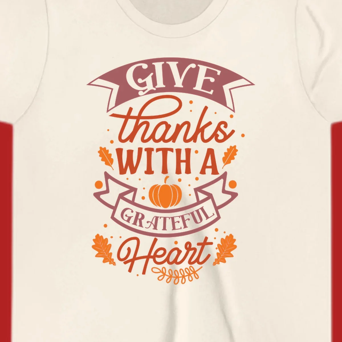Grateful Heart Thanksgiving design with text, pumpkin, and leaves.