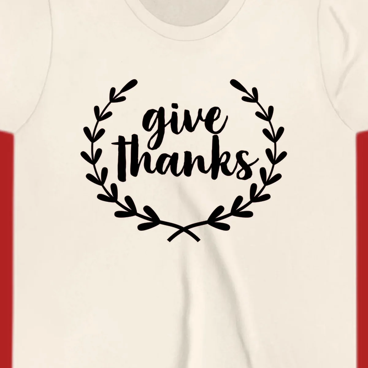 Give thanks script text inside a laurel wreath.
