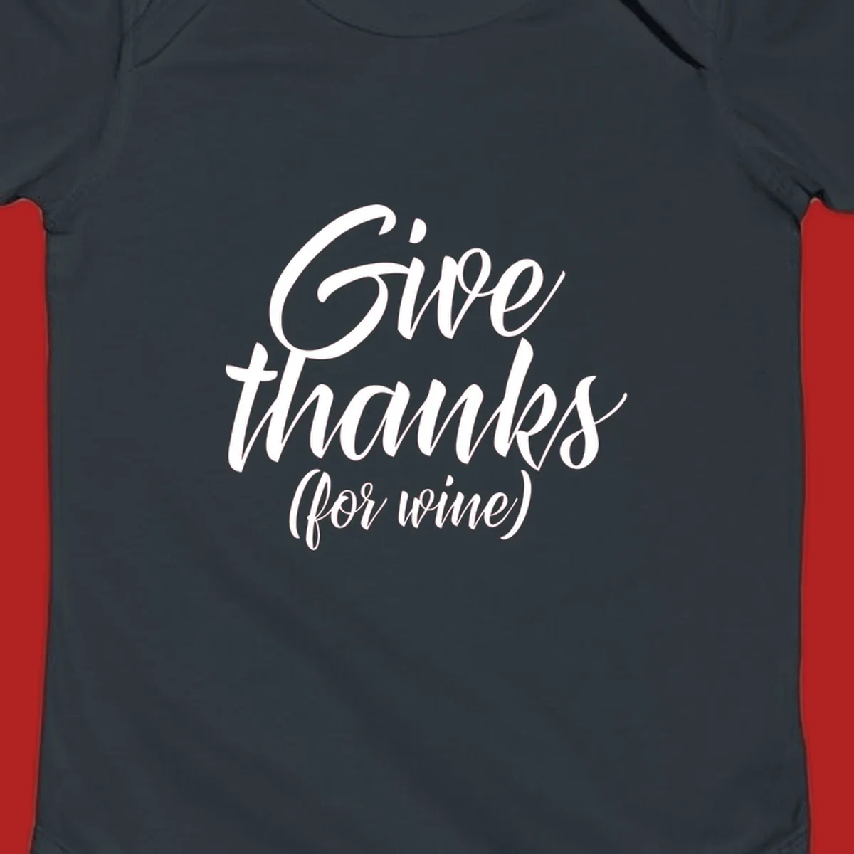 Give thanks for wine typography design with white script on black.