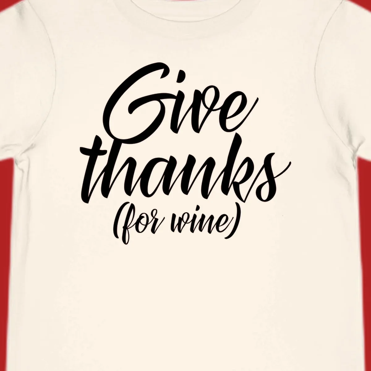 Give thanks for wine typography design with white script on black.