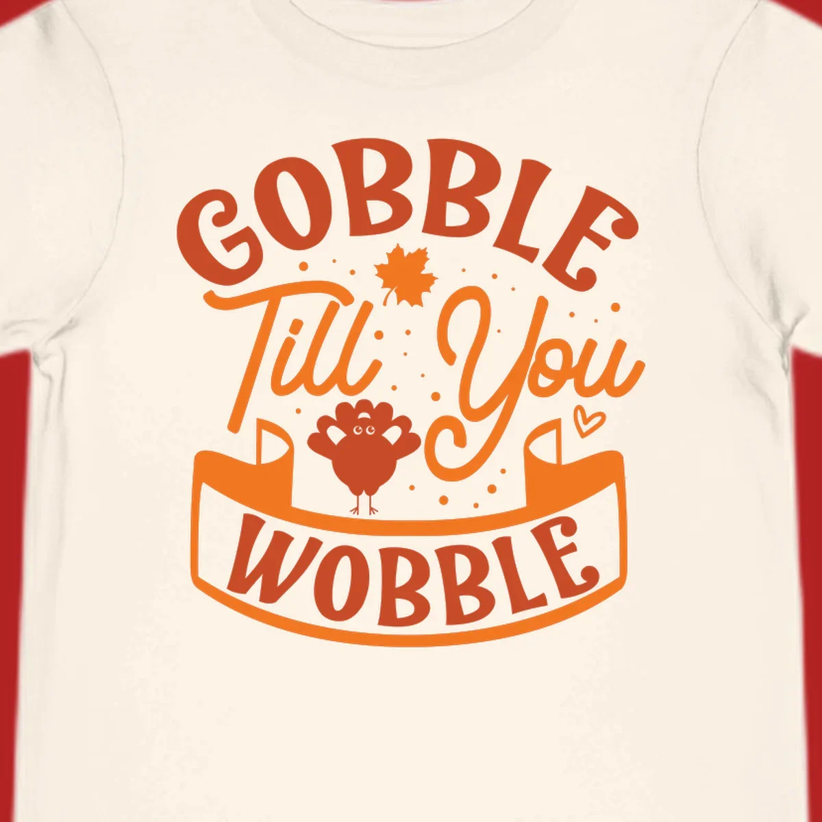 Gobble Till You Wobble Thanksgiving design with turkey illustration and text.