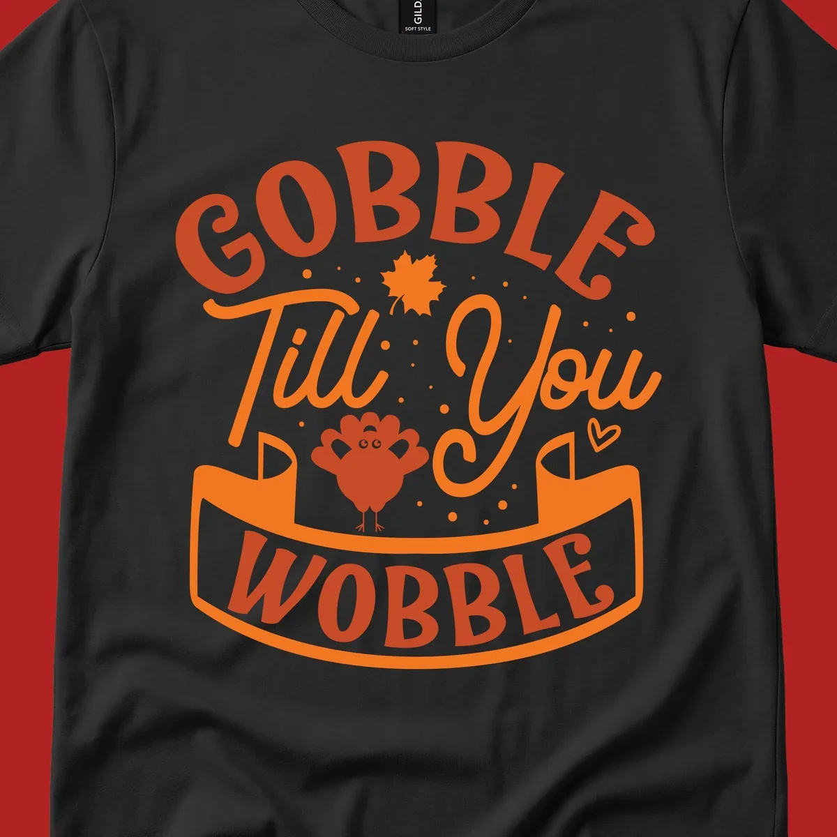 Gobble Till You Wobble Thanksgiving design with turkey illustration and text.