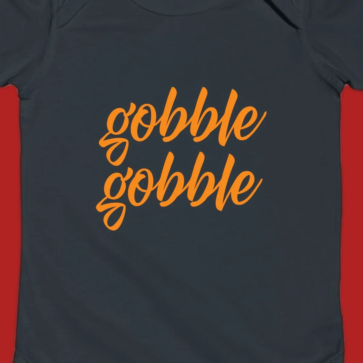 Orange script text 'gobble gobble' repeated twice. Thanksgiving phrase.