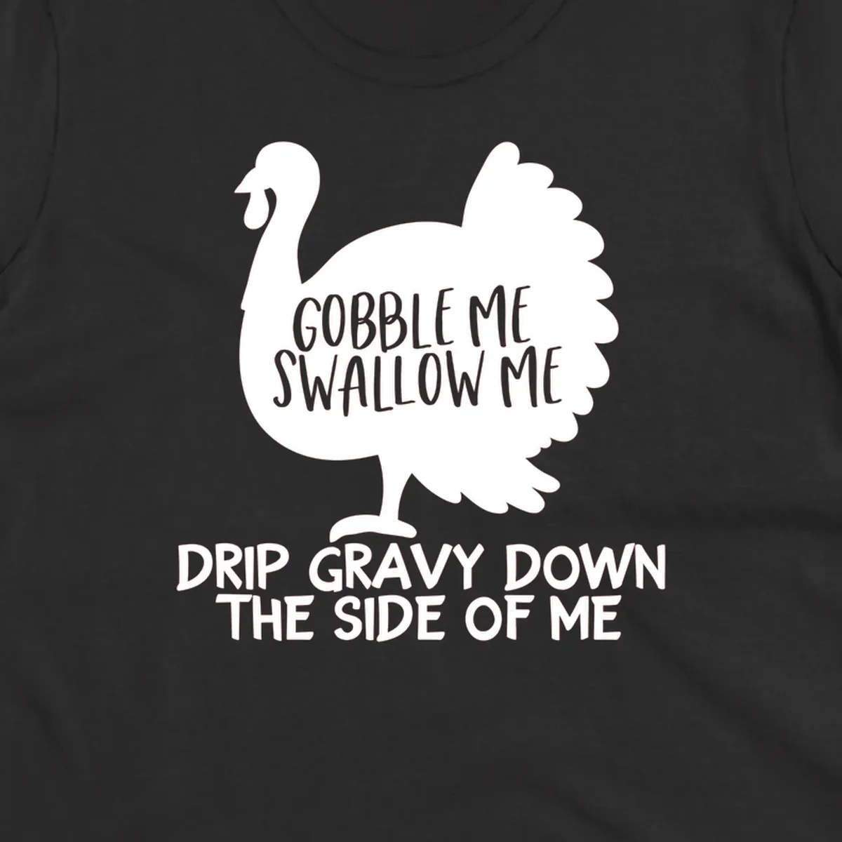 Thanksgiving turkey design with text, featuring a silhouette and the phrase 'Gobble Me Swallow Me Drip Gravy Down The Side Of Me'.