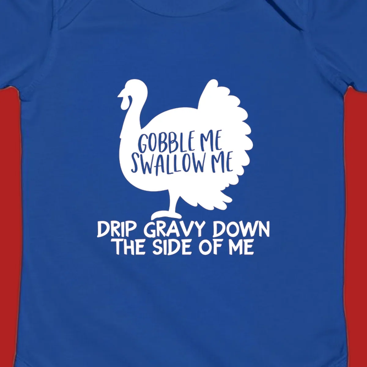 Thanksgiving turkey design with text, featuring a silhouette and the phrase 'Gobble Me Swallow Me Drip Gravy Down The Side Of Me'.
