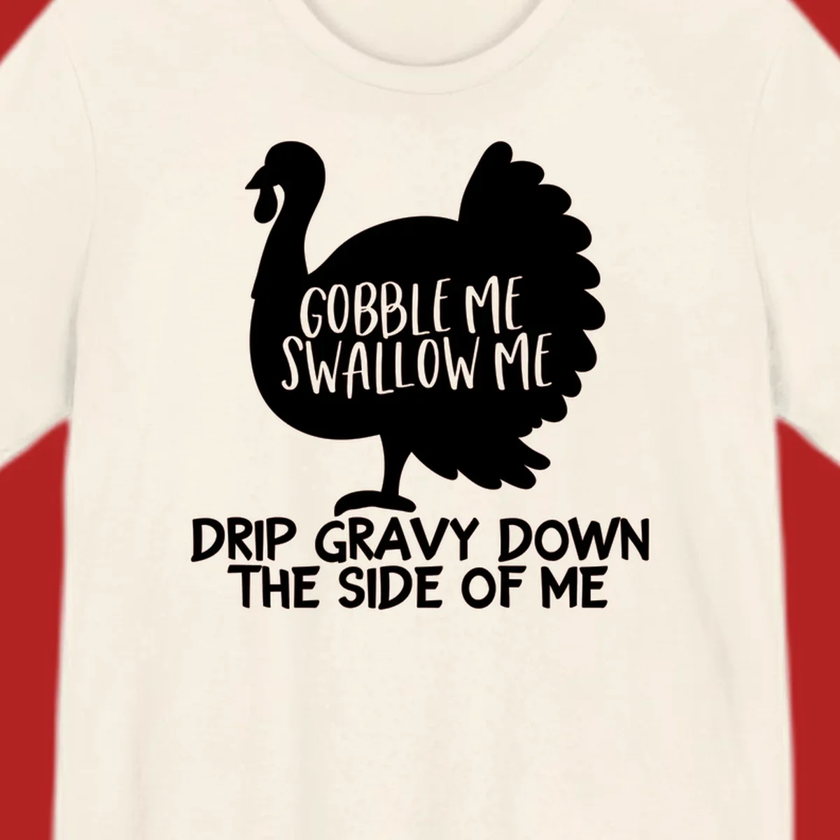 Thanksgiving turkey design with text, featuring a silhouette and the phrase 'Gobble Me Swallow Me Drip Gravy Down The Side Of Me'.