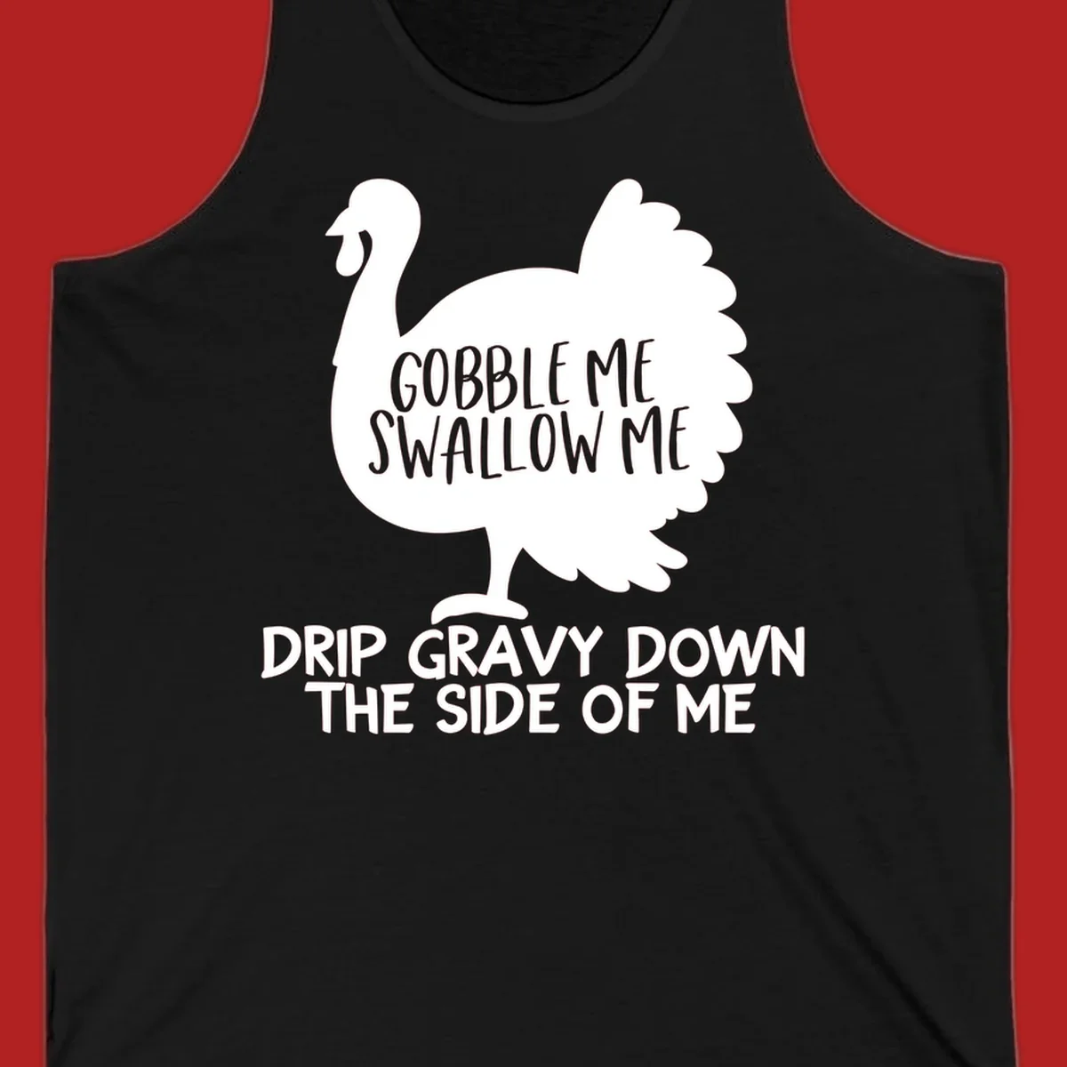 Thanksgiving turkey design with text, featuring a silhouette and the phrase 'Gobble Me Swallow Me Drip Gravy Down The Side Of Me'.
