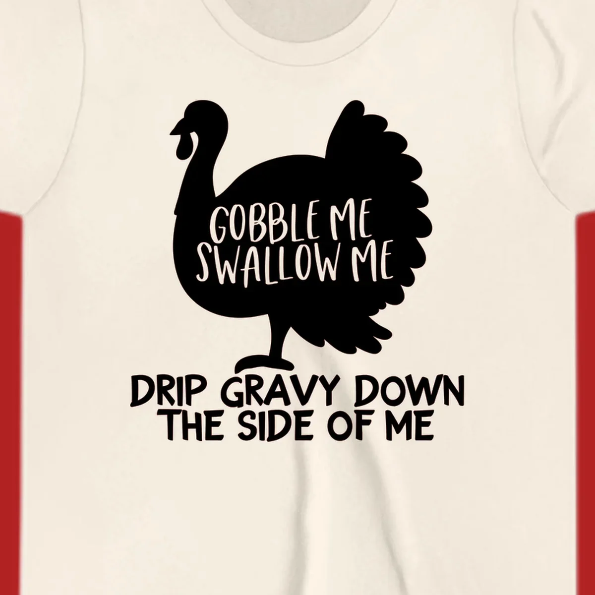 Thanksgiving turkey design with text, featuring a silhouette and the phrase 'Gobble Me Swallow Me Drip Gravy Down The Side Of Me'.