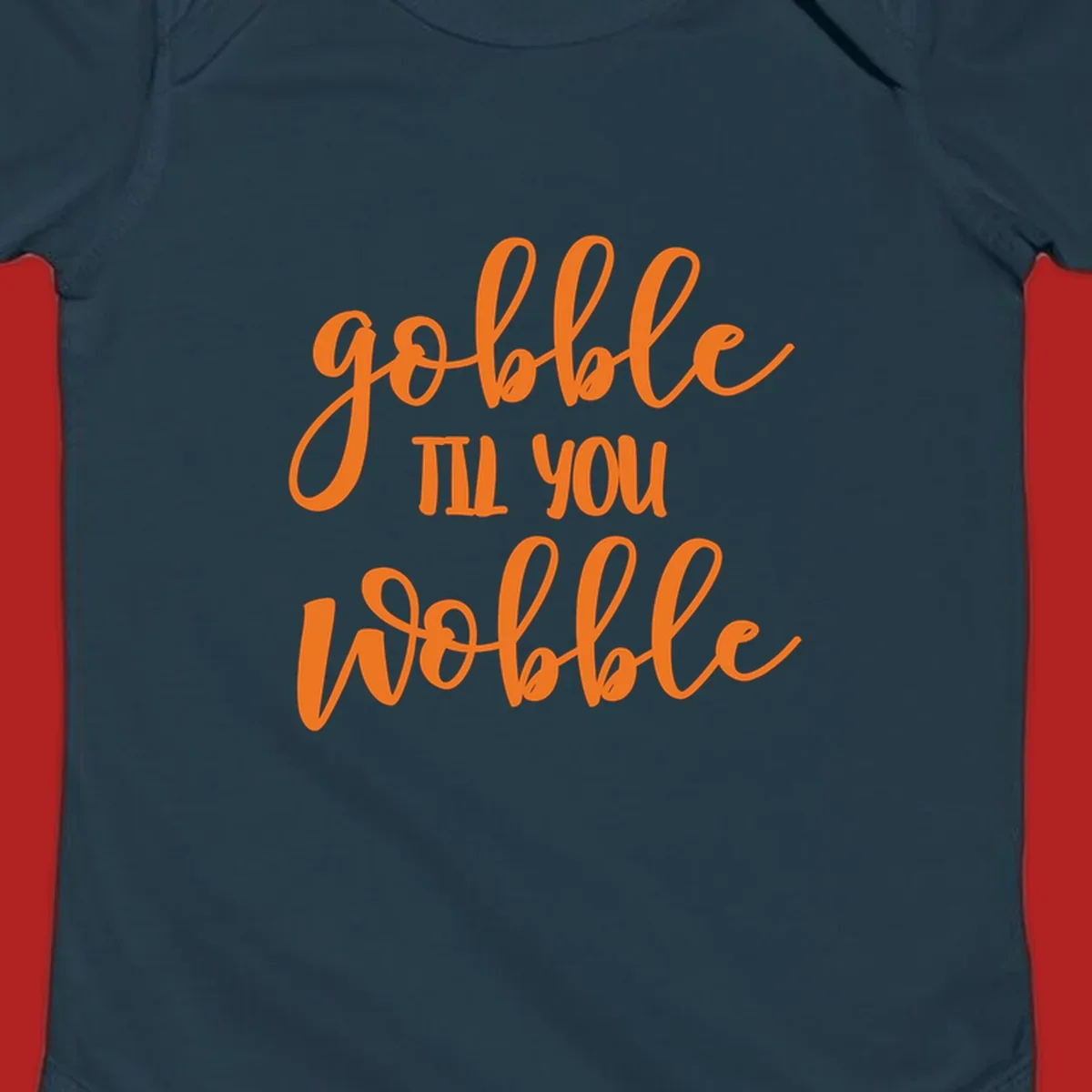 Gobble Wobble Thanksgiving phrase in orange script.