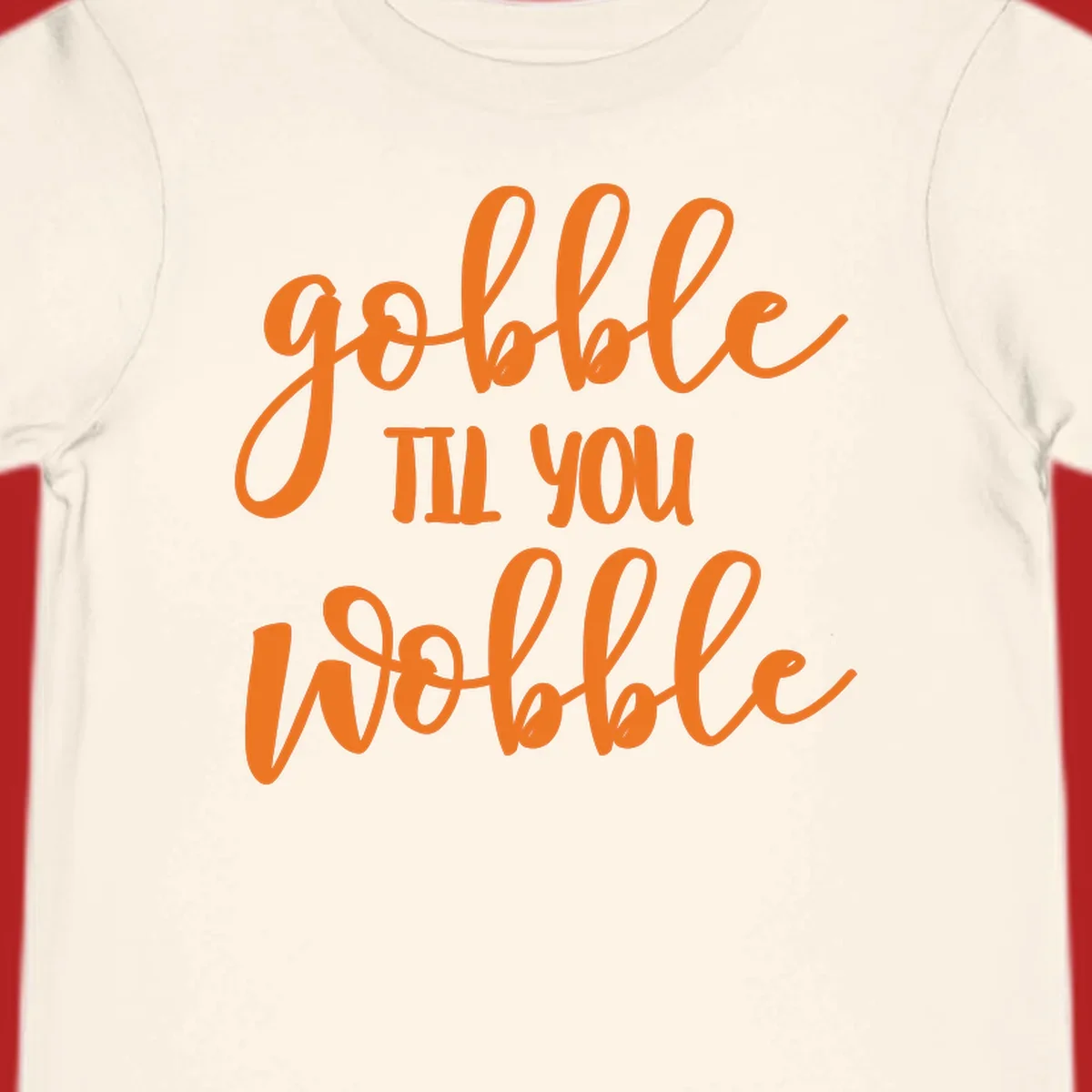 Gobble Wobble Thanksgiving phrase in orange script.