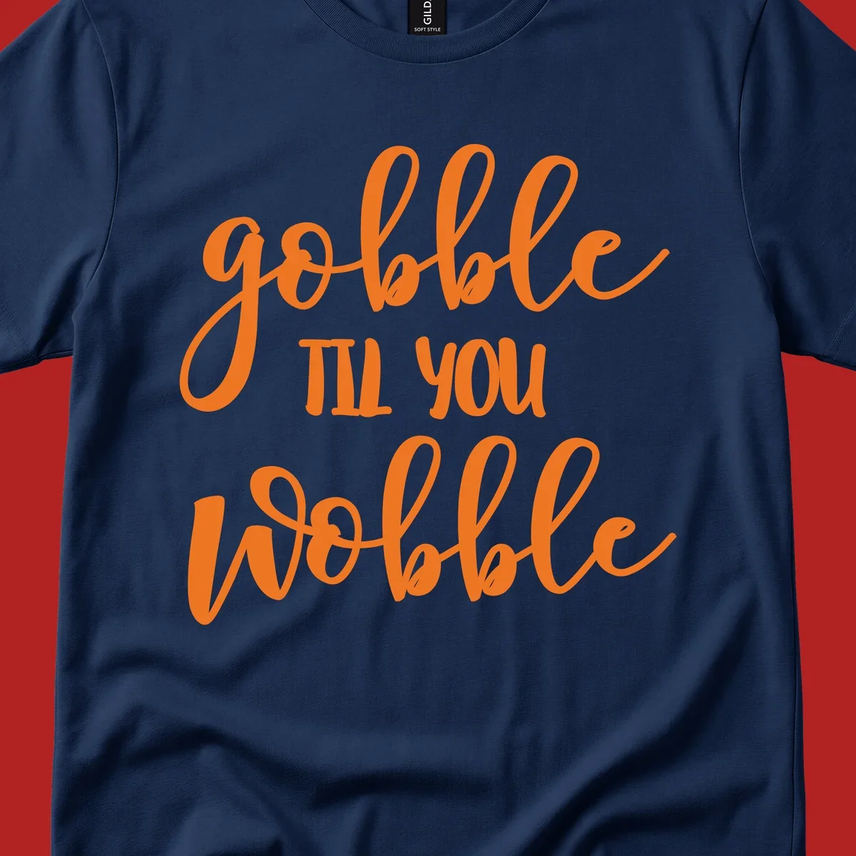 Gobble Wobble Thanksgiving phrase in orange script.