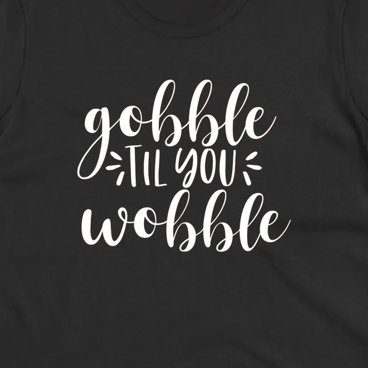 Gobble 'til you wobble thanksgiving phrase in white script font.