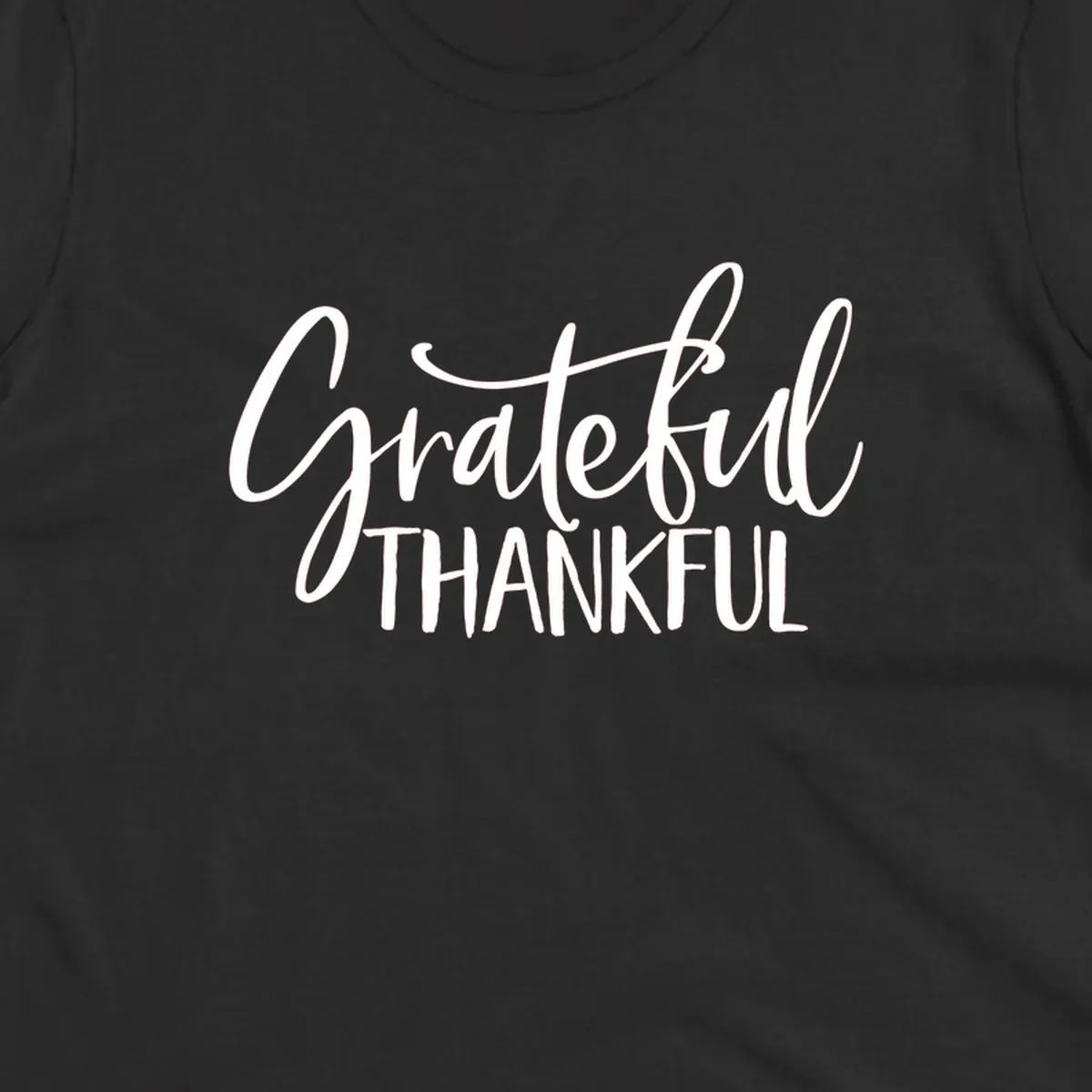 Grateful and Thankful text in white script and block fonts. grateful-thankful-script.