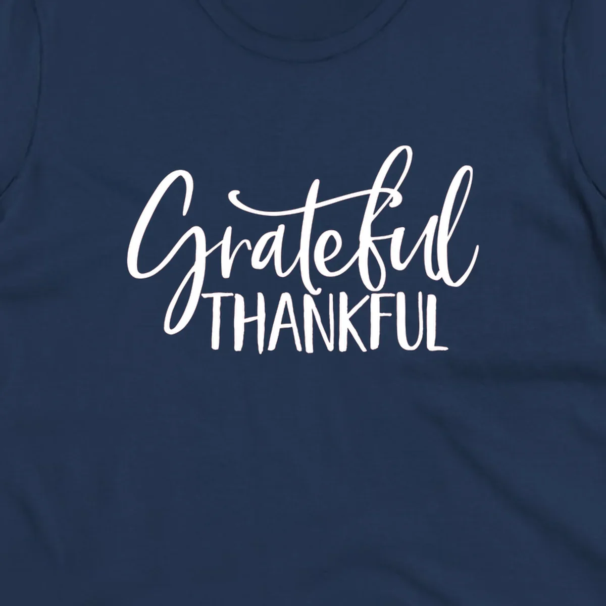 Grateful Thankful typography design with white script and block text.