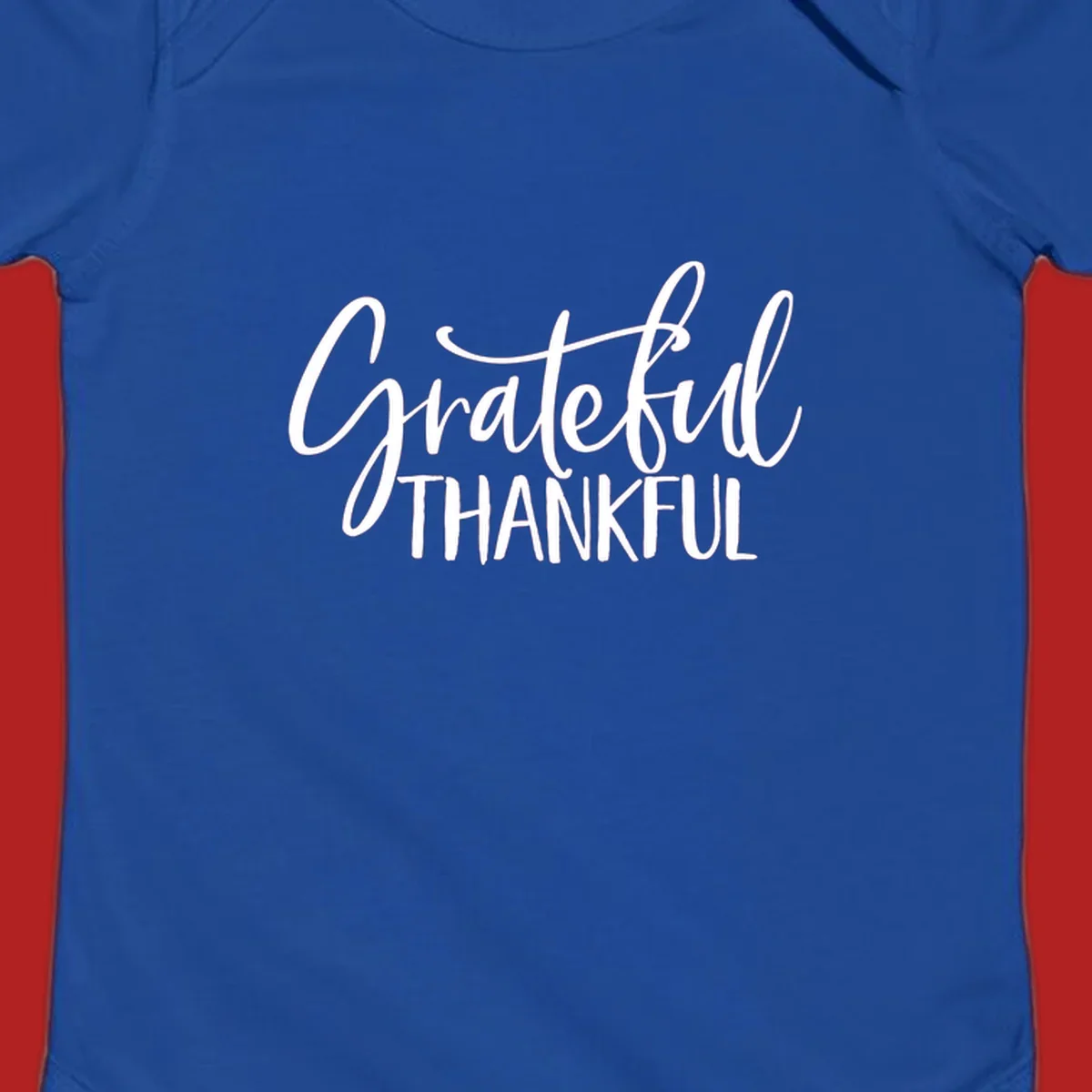 Grateful Thankful typography design with white script and block text.