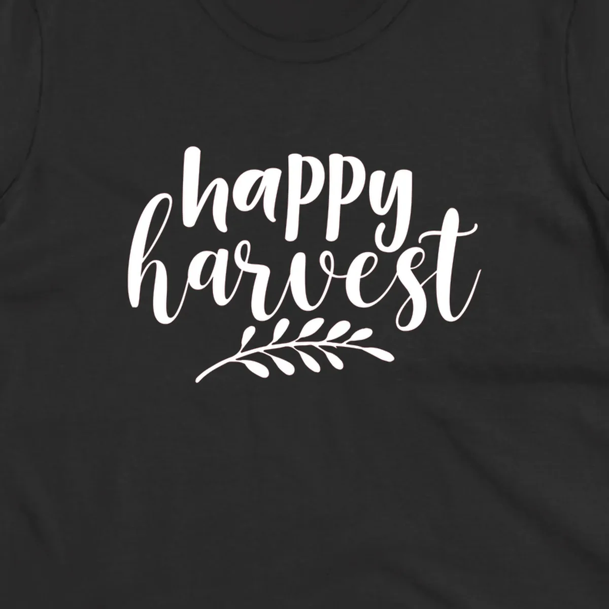 Happy Harvest text with fall leaves graphic, white on black background