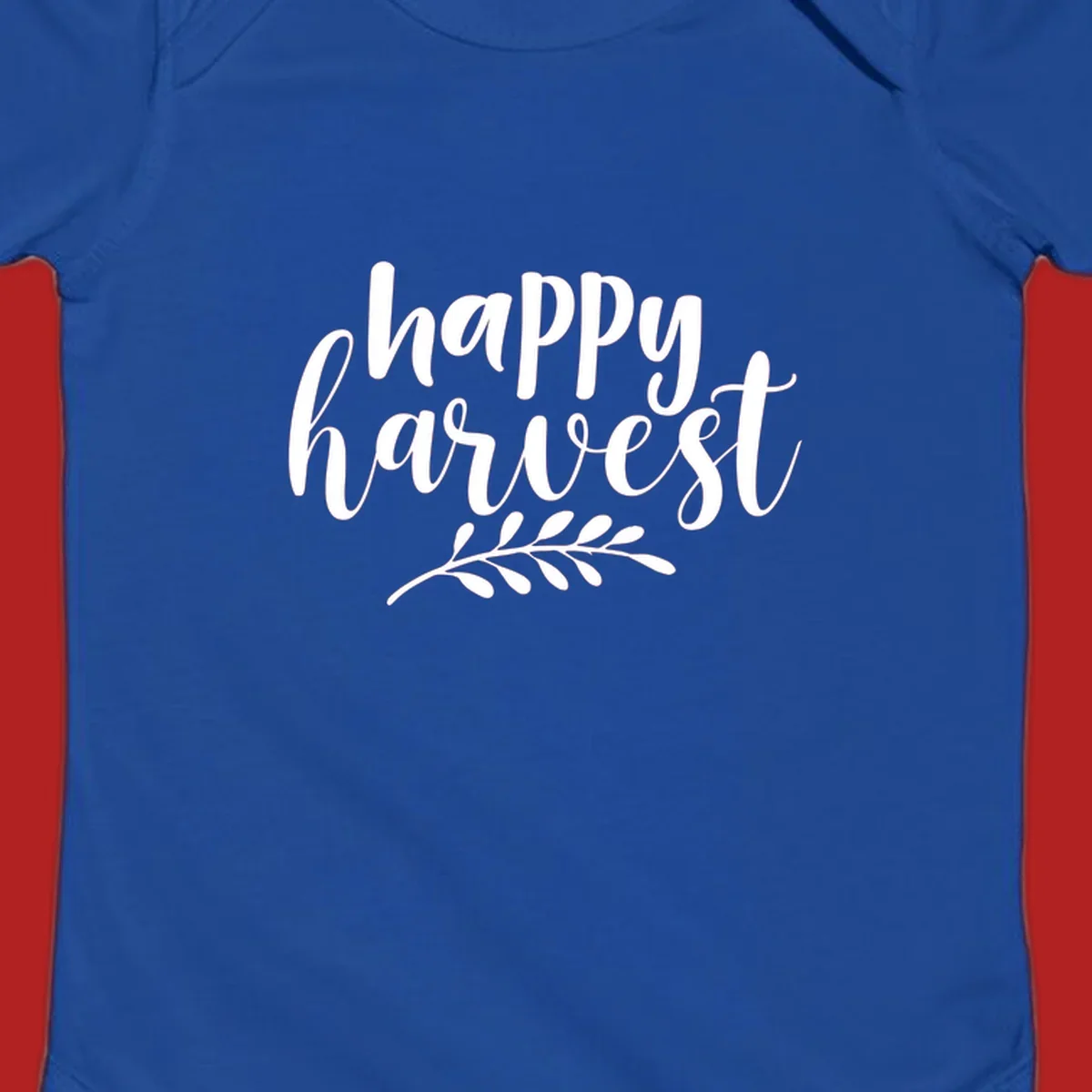 Happy Harvest text with fall leaves graphic, white on black background