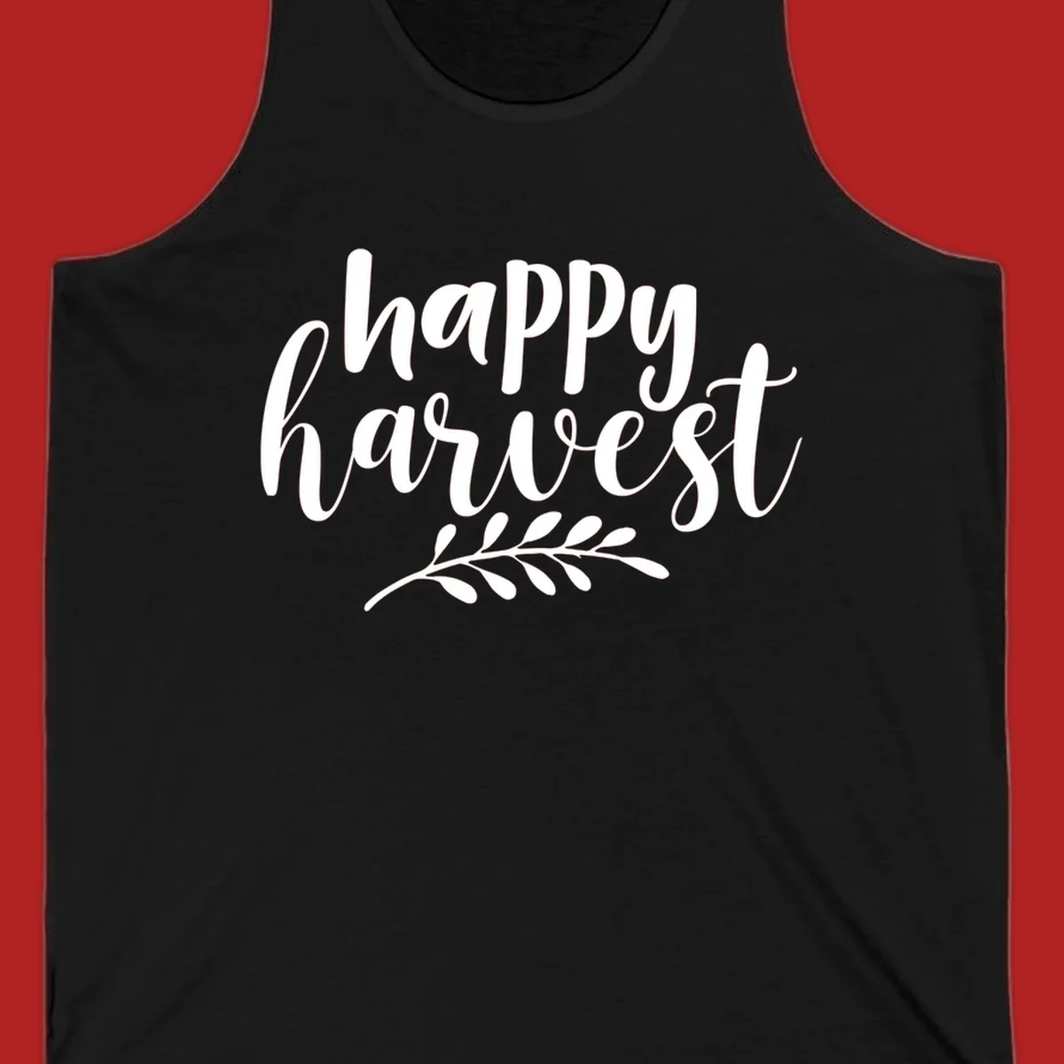 Happy Harvest text with fall leaves graphic, white on black background