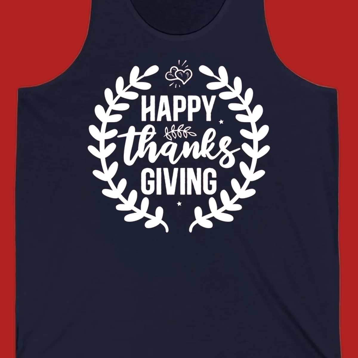 Happy Thanksgiving lettering inside a laurel wreath with hearts and stars.