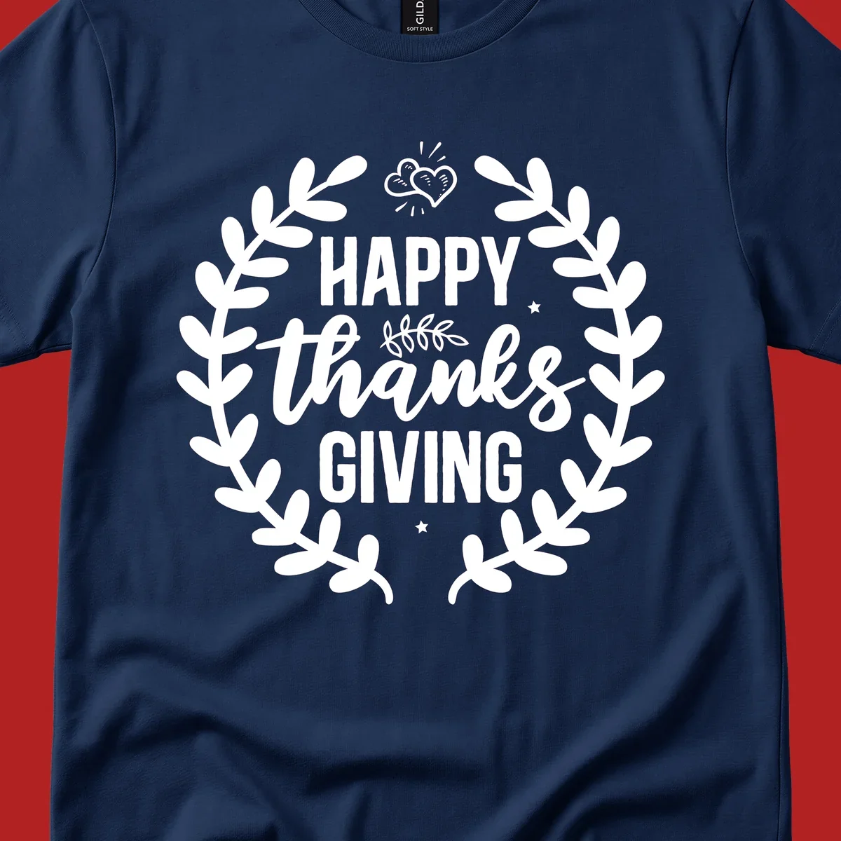 Happy Thanksgiving lettering inside a laurel wreath with hearts and stars.