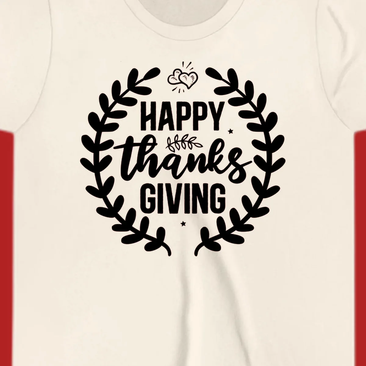 Happy Thanksgiving lettering inside a laurel wreath with hearts and stars.