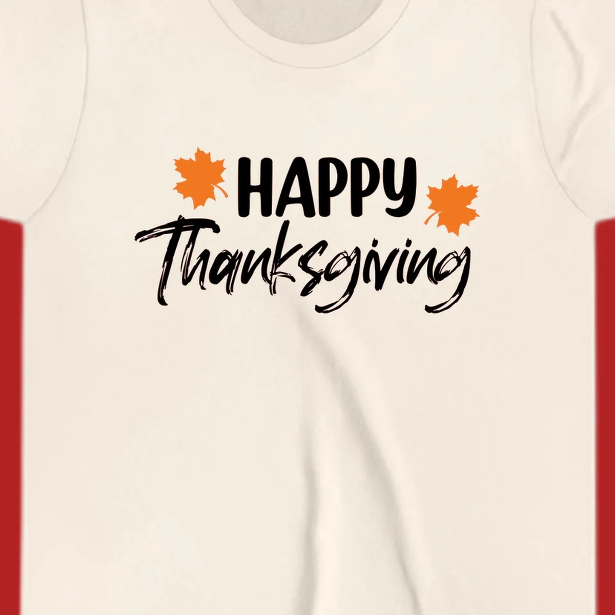 Happy Thanksgiving text with orange maple leaves, holiday design.