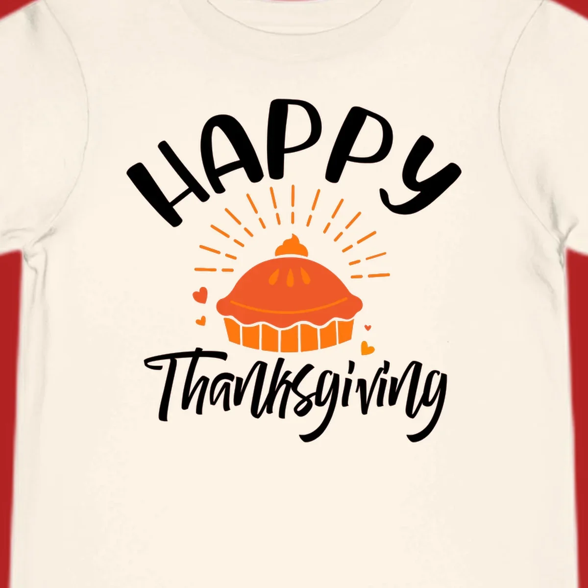 Happy Thanksgiving text with a pie illustration and heart accents