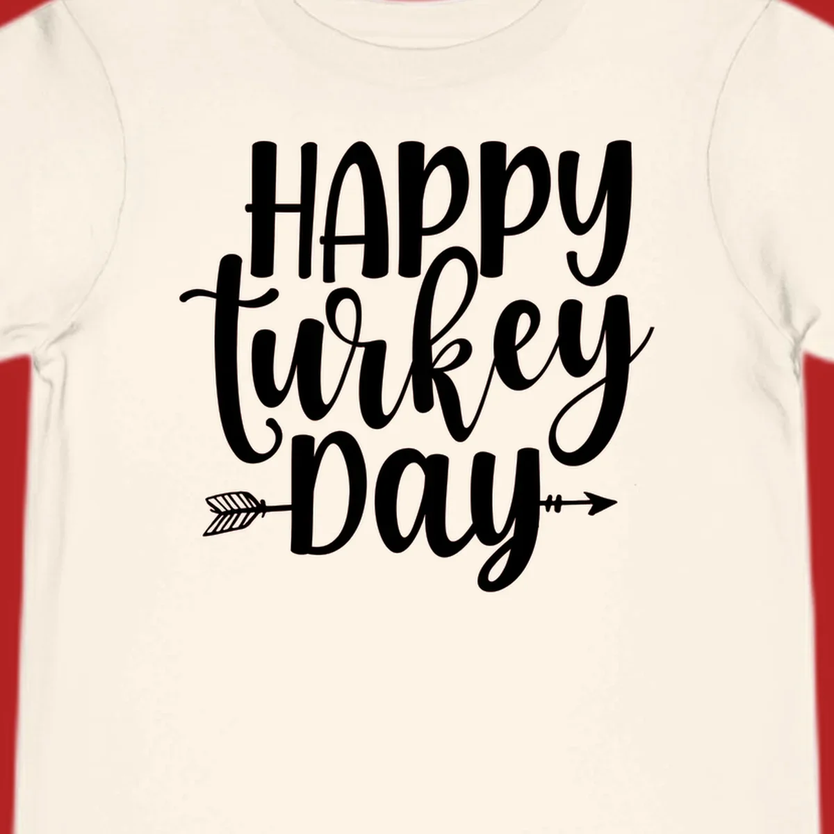 Happy Turkey Day text with arrow graphics, suitable for Thanksgiving.