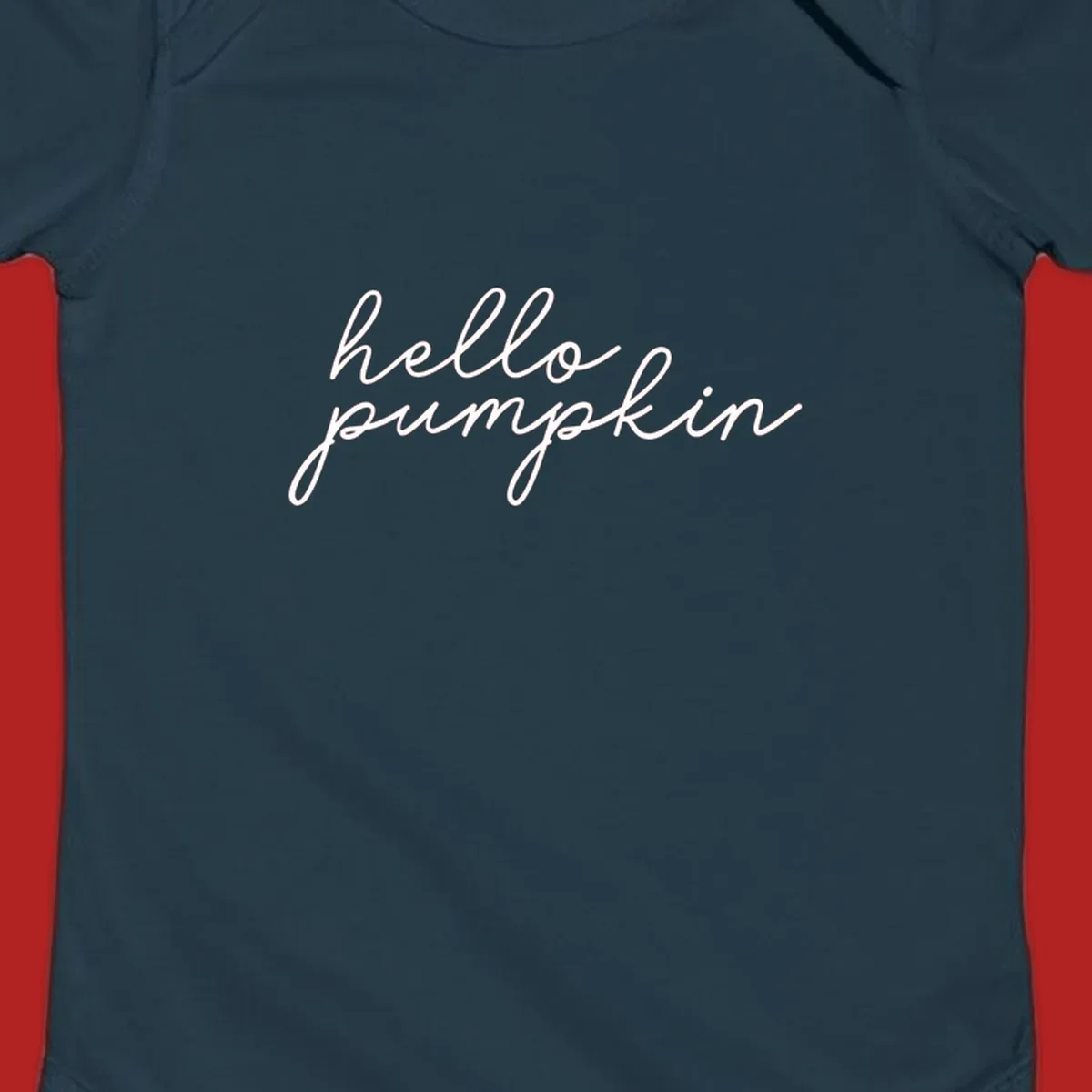 White script text reading 'hello pumpkin' on a black background.