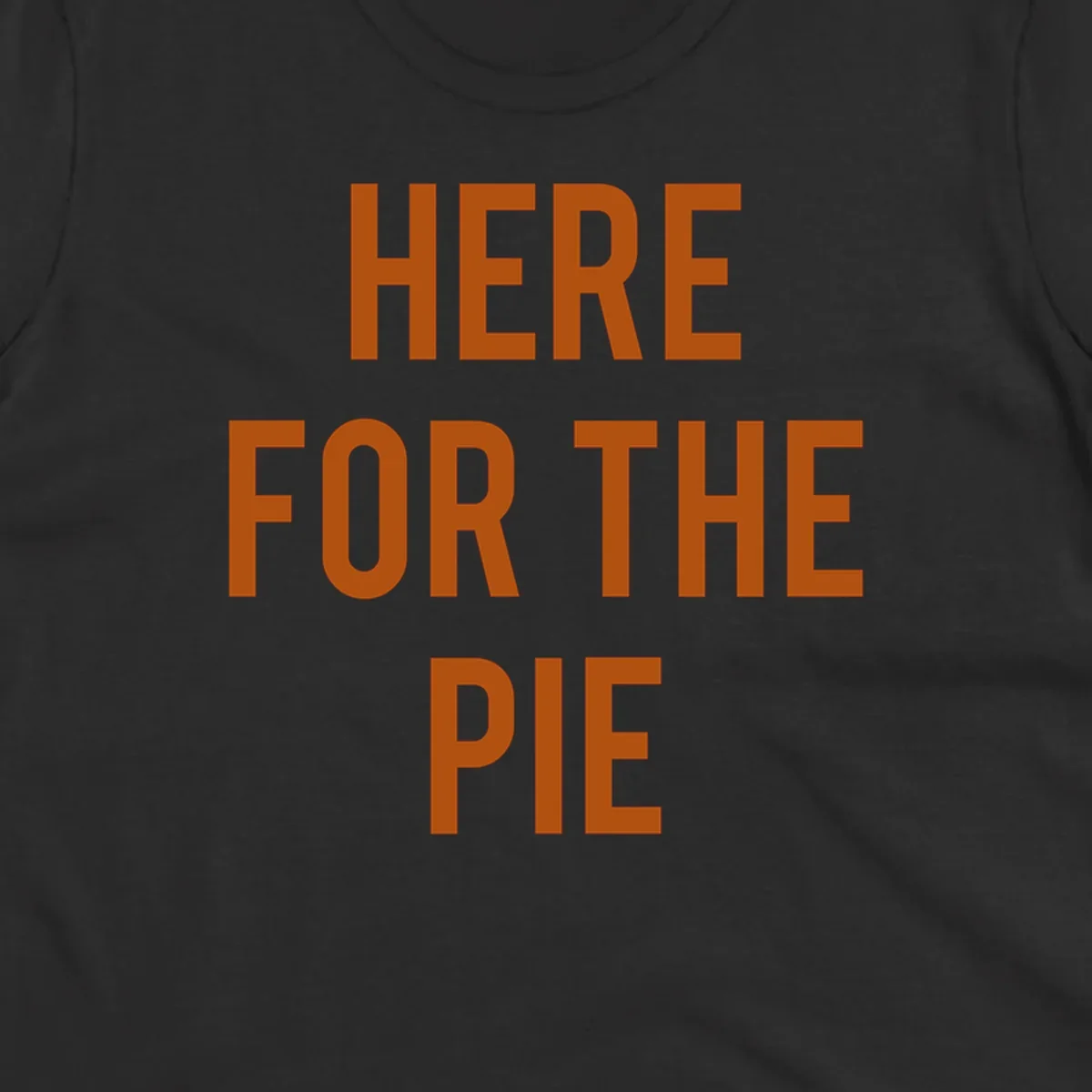 The phrase 'HERE FOR THE PIE' in bold orange lettering against a dark background.